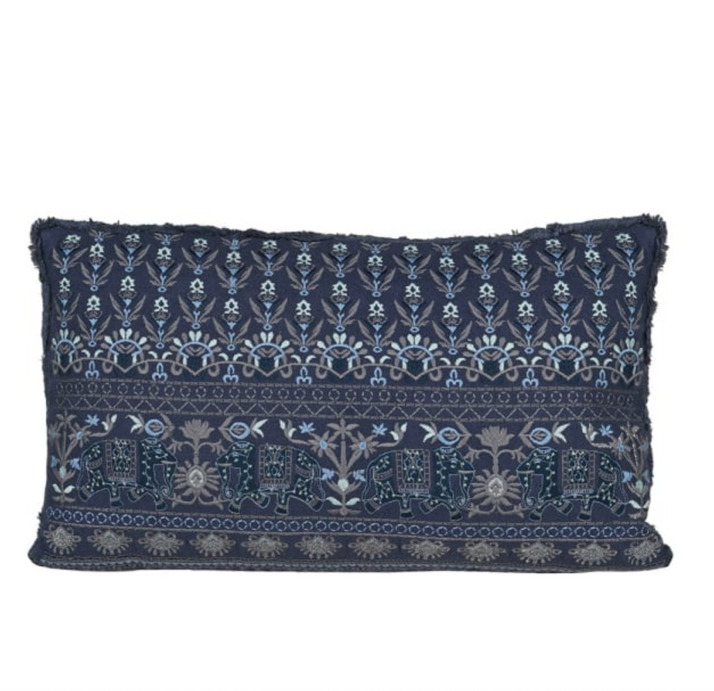 Decorative pillow with intricate patterns on a white background