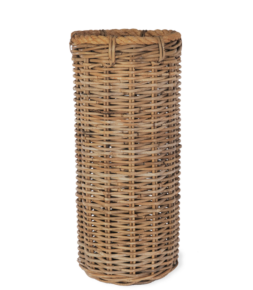 Wicker trash can on a white background
