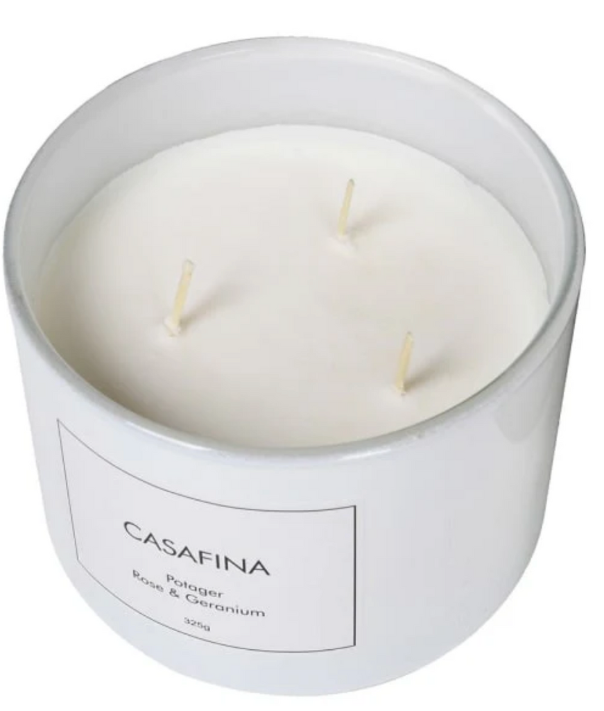 Casafina candle with three wicks in a white container on a white background