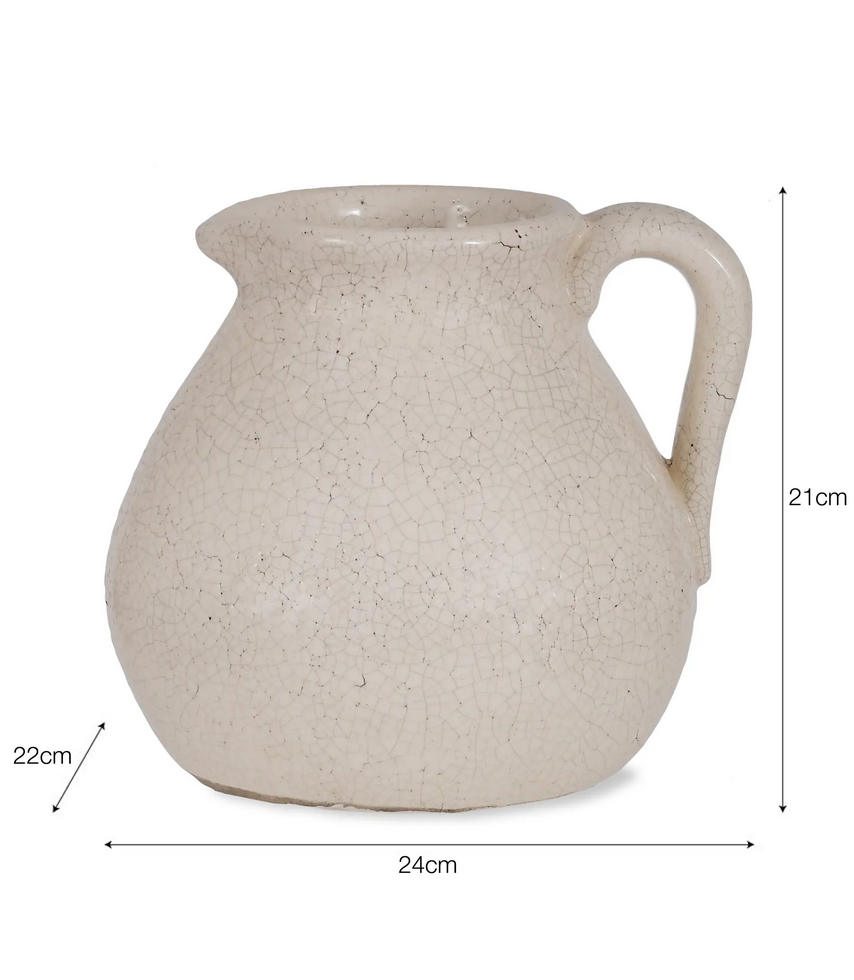 Ceramic pitcher with dimensions on a white background