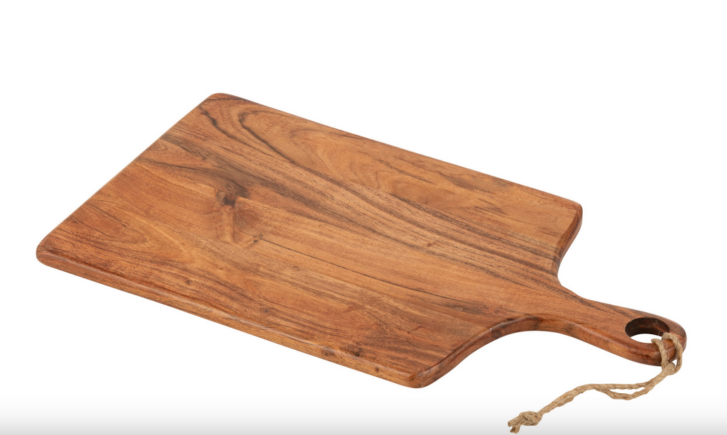 Wooden cutting board with handle on a white background