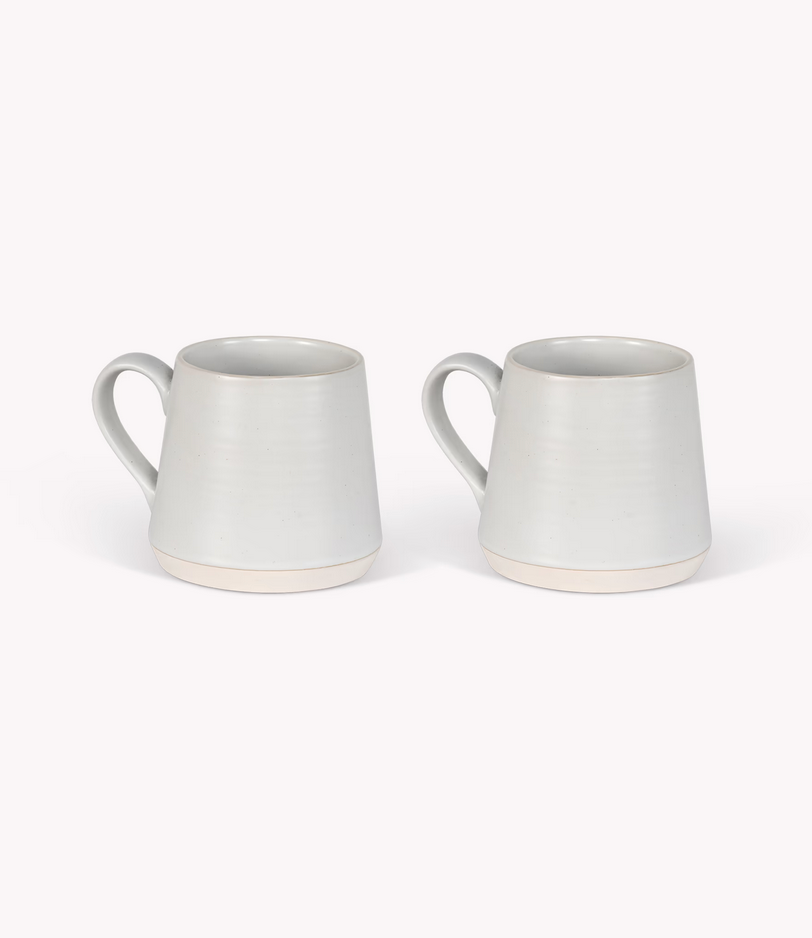 Two light gray ceramic mugs on a white background