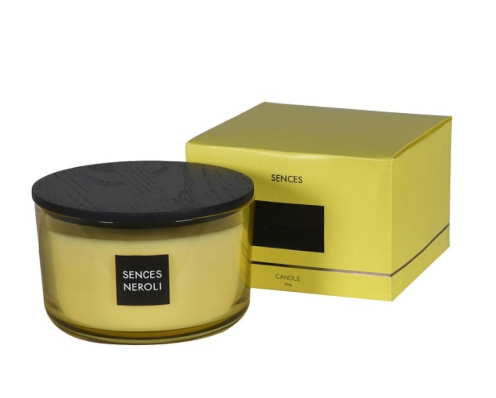 Sences Neroli candle with black lid and matching packaging on a white background