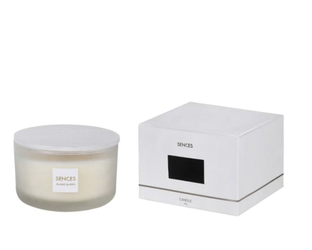 Scented candle with packaging on a white background