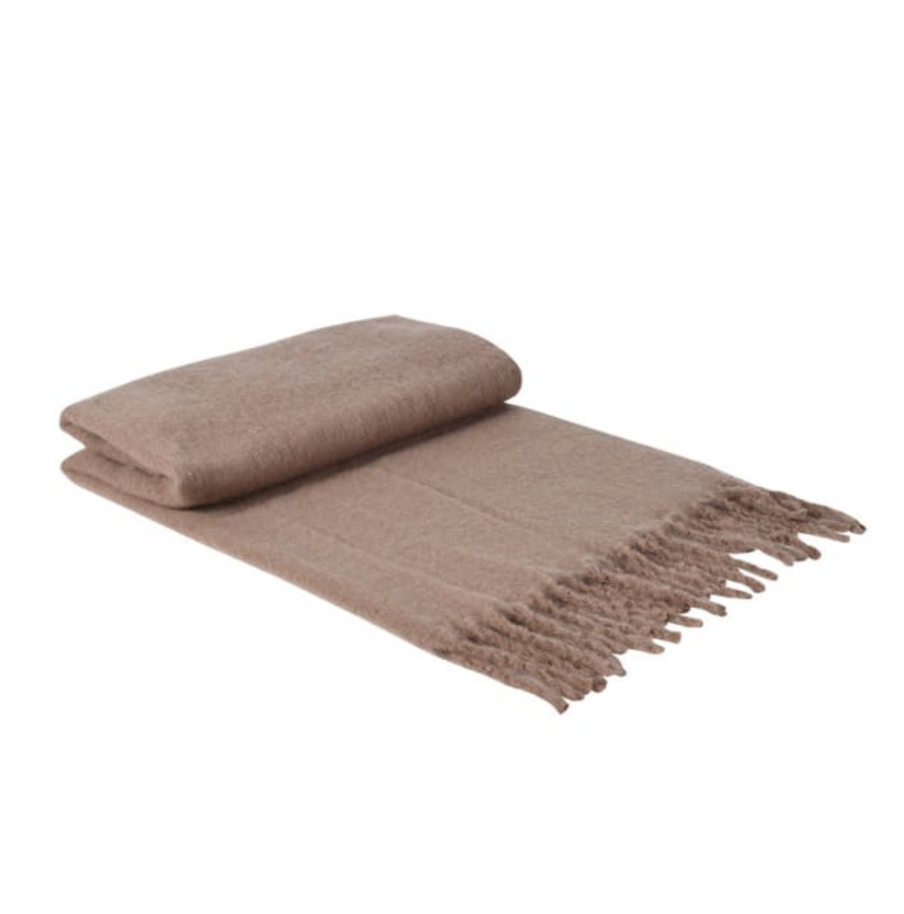 Brown woven blanket with fringes on a white background